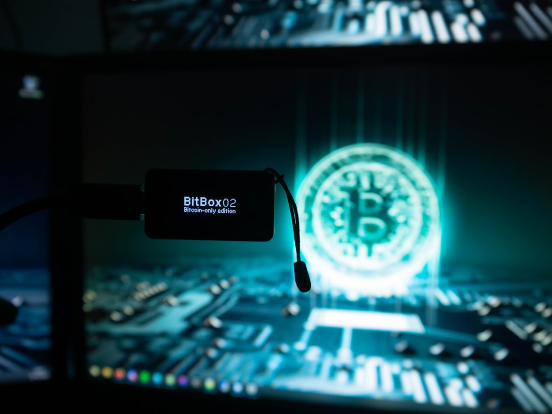 a-bitcoin-lit-up-on-a-computer-screen-rn9zqeaqnuy